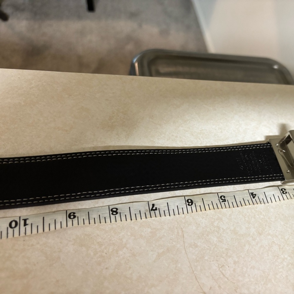 Nike Golf Black Belt with Silver Buckle reversible to white.